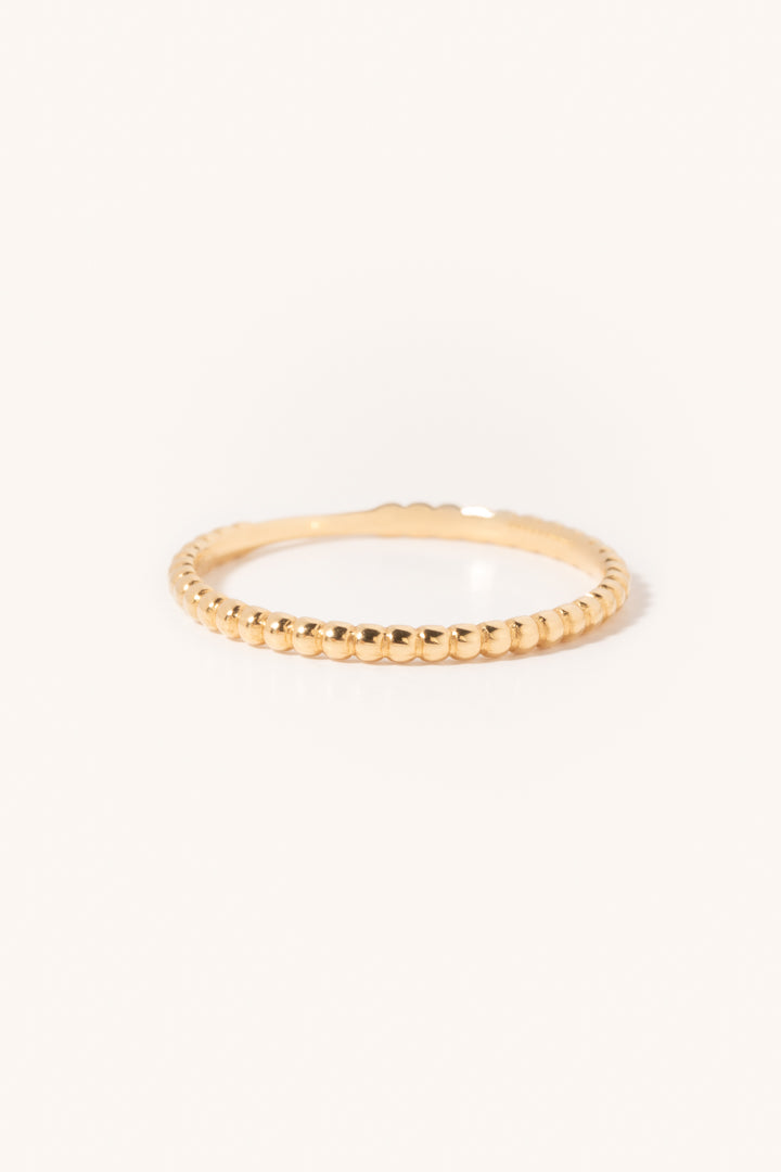 Bague pour femme effet perlé en or jaune 18 carats