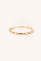 Bague pour femme effet perlé en or jaune 18 carats